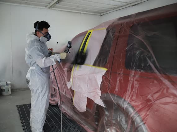 Auto paint refinishing technician at work in Las Vegas