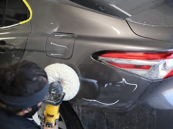 Paint correction close-up on vehicle rear panel at Best Class Auto Body Las Vegas